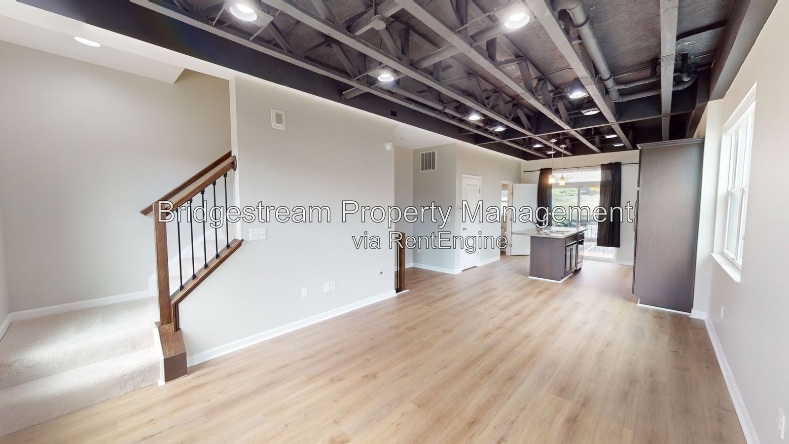 Beautiful 2 bedroom, 1.5 bath townhome with 1 car attached garage and reserved parking space in Downtown Dayton near Riverscape property image