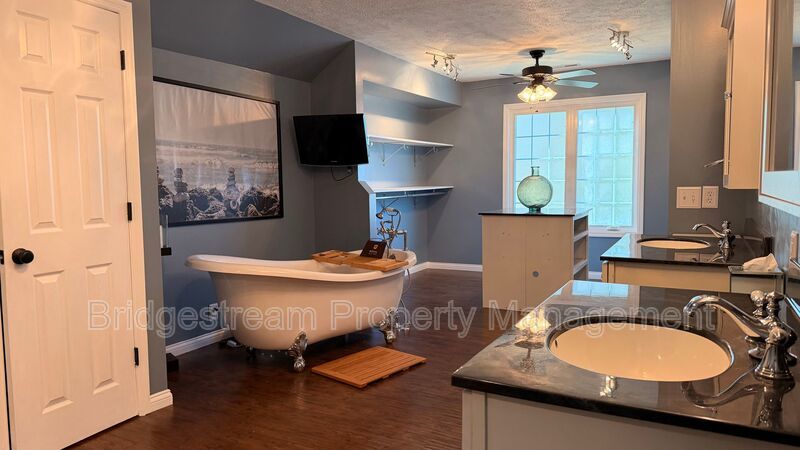 Stunning 4-Bedroom Home with Finished Basement, Movie Theater & Incredible Outdoor Space property image