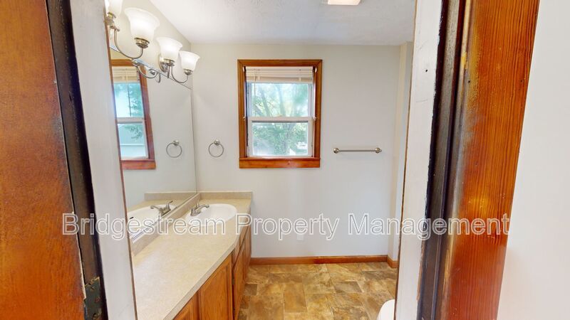 3 Bedroom, 1.5 bath home with 2 car detached garage and basement in Brookville property image