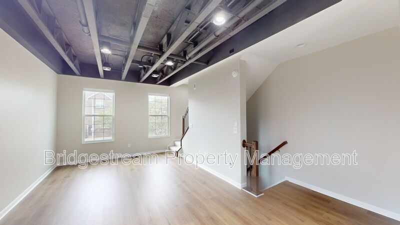 Beautiful 2 bedroom, 1.5 bath townhome with 1 car attached garage and reserved parking space in Downtown Dayton near Riverscape property image